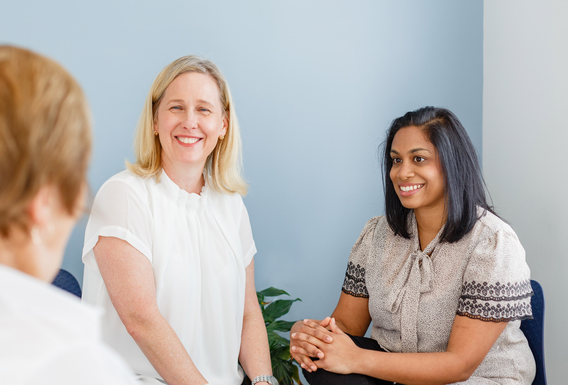 HTC Felicity & Sunita talking with a patient